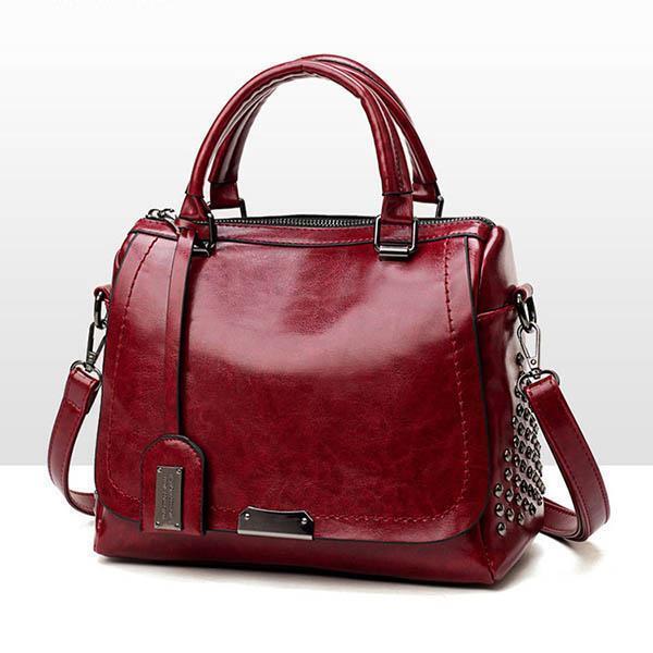🔥Vendita limitata️🔥Borsa in pelle di lusso con rivetti