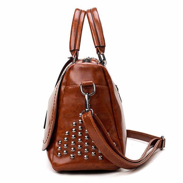 🔥Vendita limitata️🔥Borsa in pelle di lusso con rivetti